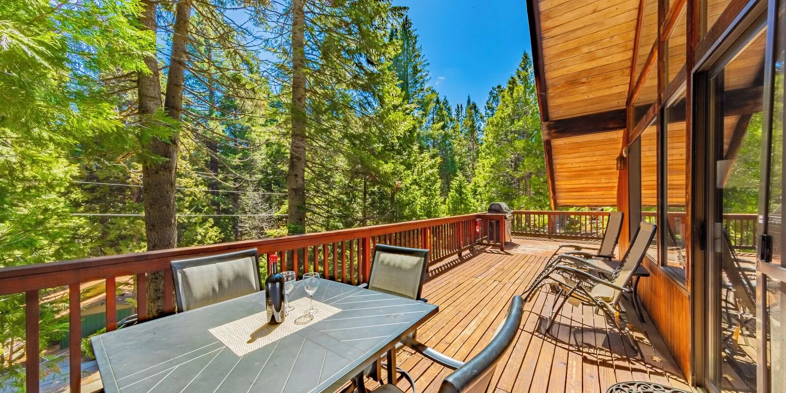 The front deck: in the pines, with a large gas BBQ